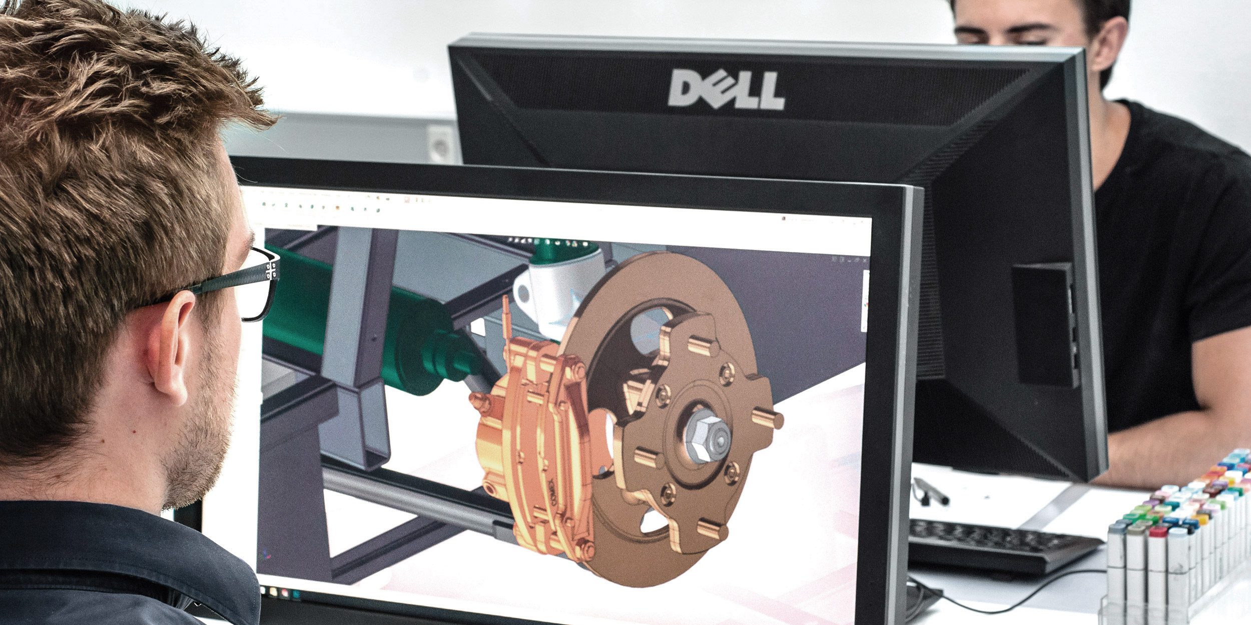 Employee working at his computer at Artlinco